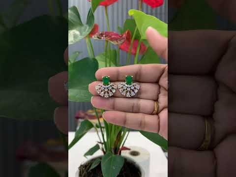 Beautiful gj polish studs with green stone